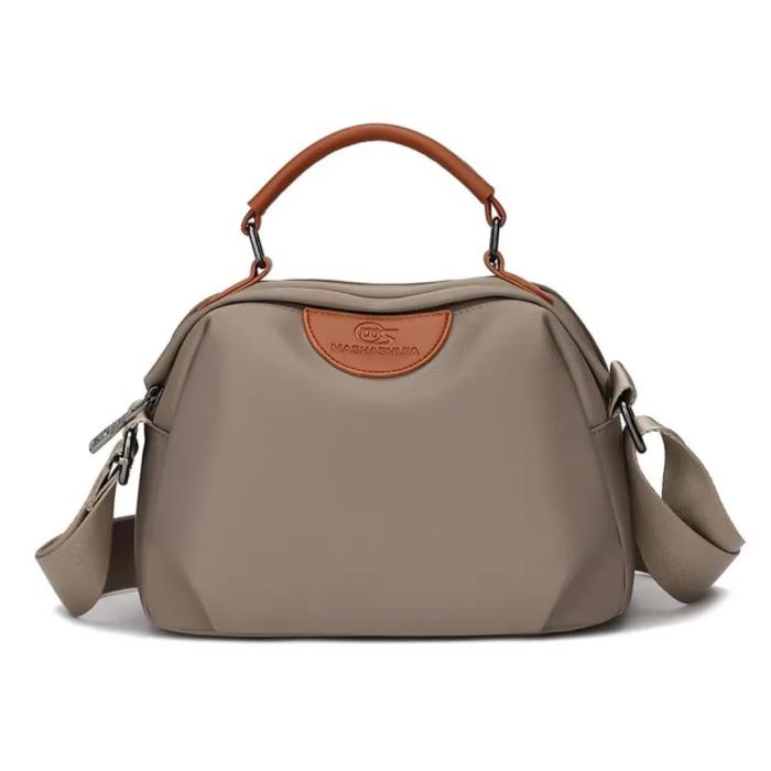1775111084-IMG-20250421-WA0057-(1) New Portable Nylon Cloth with Cowhide Shoulder Bag Grey - Image 1